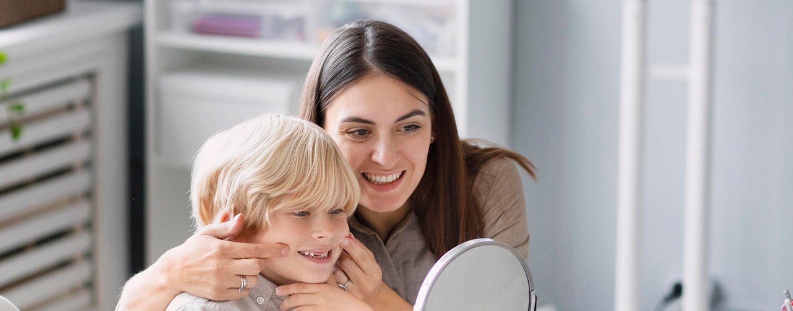 woman-doing-speech-therapy-with-little-boy-her-clinic