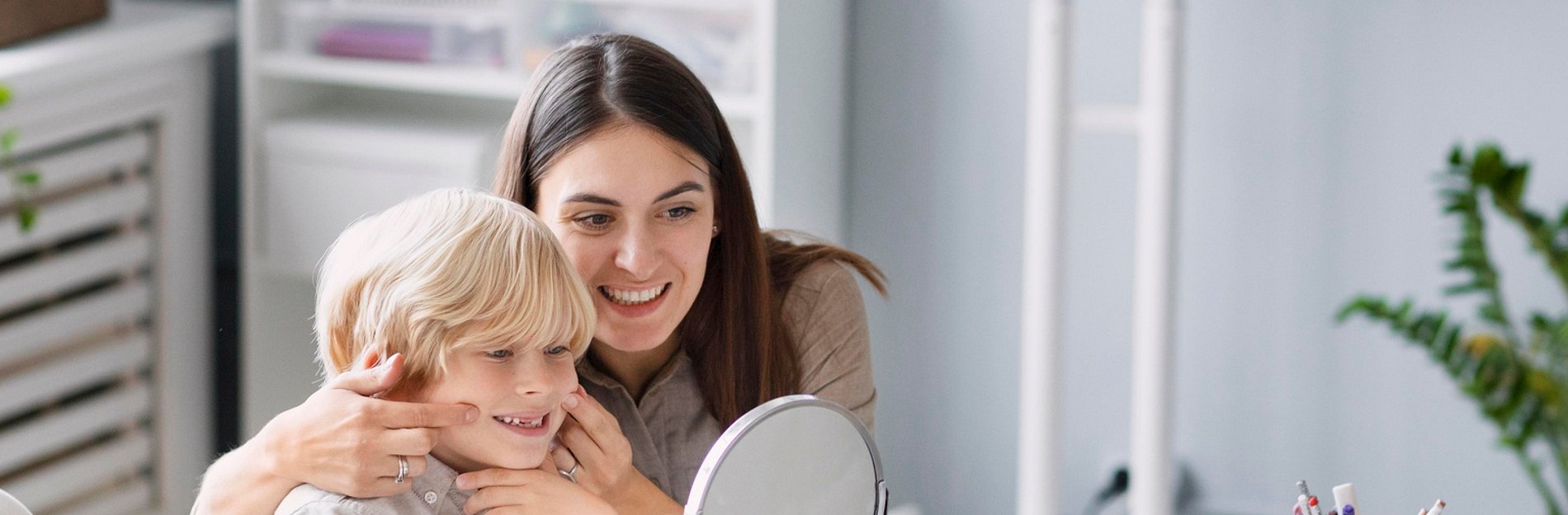woman-doing-speech-therapy-with-little-boy-her-clinic