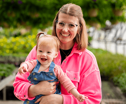 Image of adult holding toddler